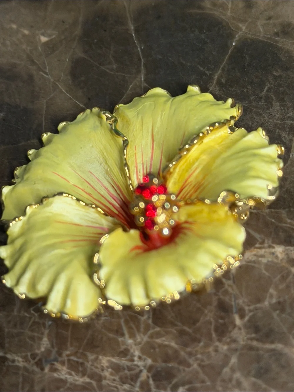 Gorgeous yellow hibiscus red crystal stand can be used as a pendant or brooch